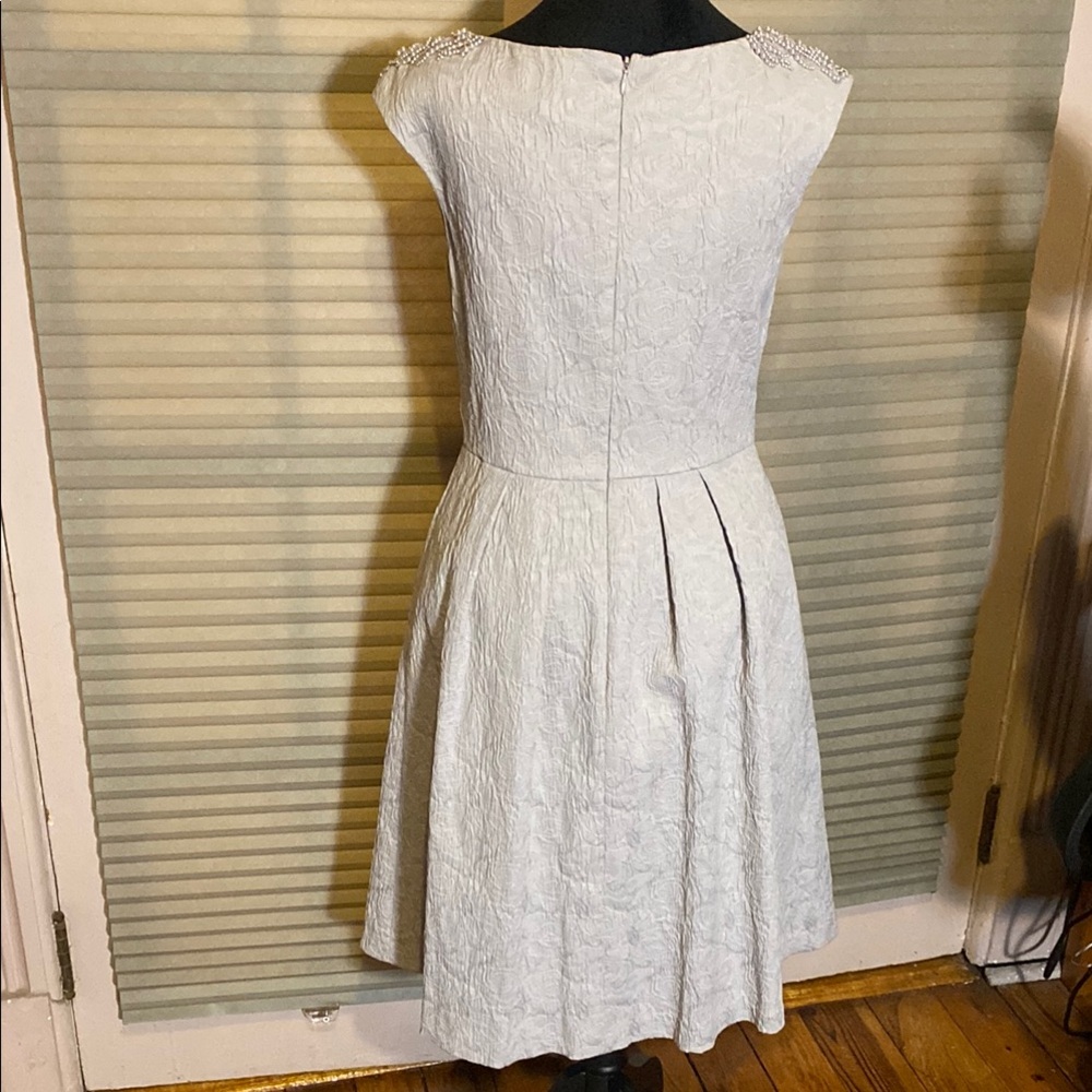 Elegant Creamy White Sleeveless Dress with beading. - Picture 5 of 6